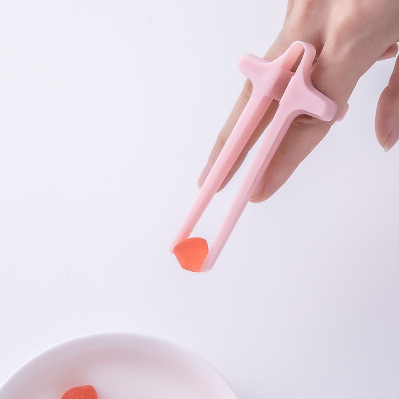 Playing games with fingers chopsticks snacking clips not dirty hands chopsticks finger loops - V.I.P Digital Presence