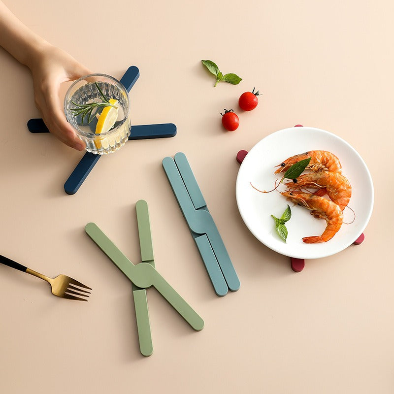 X-shaped heat-resistant and heat-resistant silicone non slip dining table mat - V.I.P Digital Presence