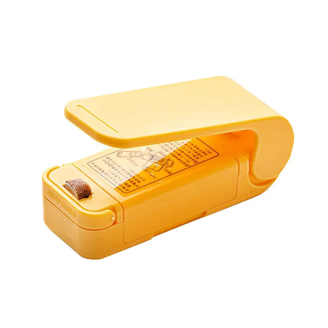 Mini sealing machine small household plastic sealing machine snack moisture-proof sealing machine - V.I.P Digital Presence