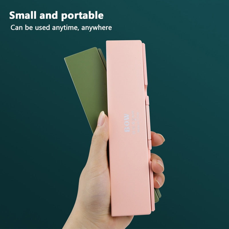 Mini teclado plegable inalámbrico compatible con Bluetooth, teclado plegable para computadora portátil, Windows, Android, tableta, iPad y teléfono.
