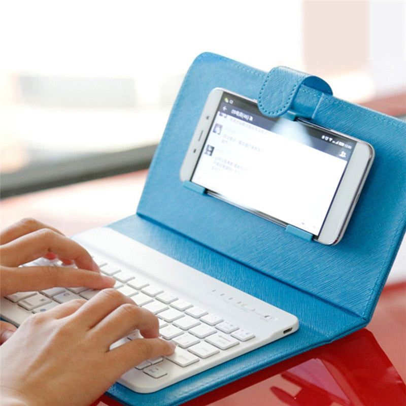 Funda de teclado inalámbrico portátil de cuero sintético para iPhone, teléfono móvil protector con teclado Bluetooth para iPhone y teléfono Android.
