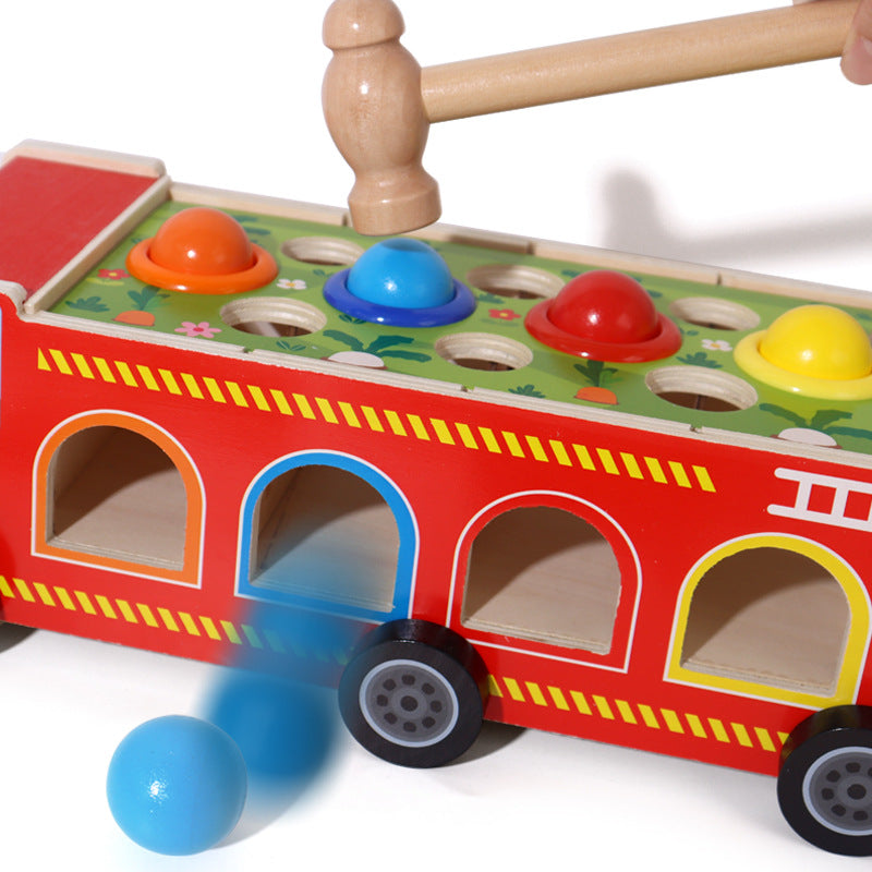 Children's early education puzzle multifunctional four in one knock ball, pull radish, cover column, fire truck, Montessori toy