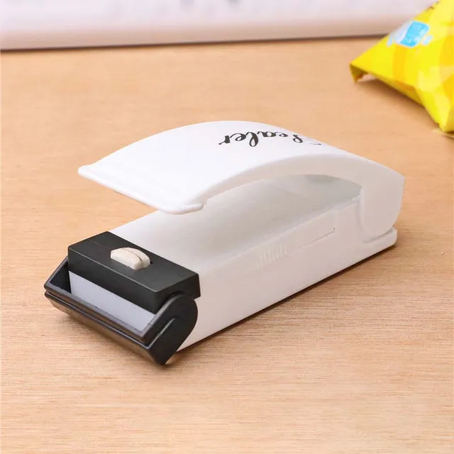 Mini sealing machine small household plastic sealing machine snack moisture-proof sealing machine - V.I.P Digital Presence