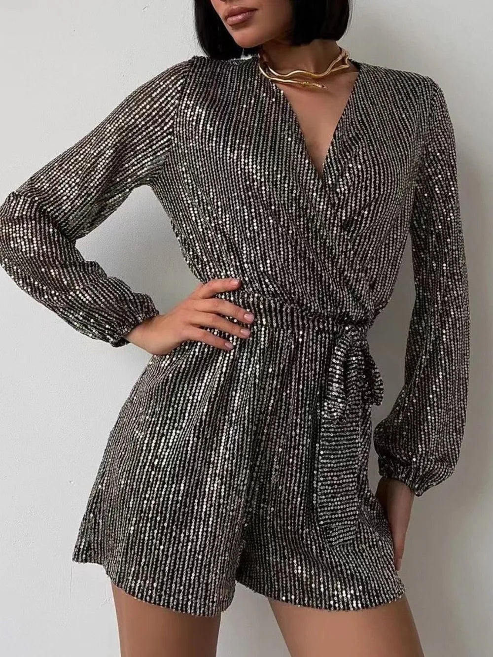 Full Size Sequin Surplice Tie Waist Long Sleeve Romper - V.I.P Digital Presence