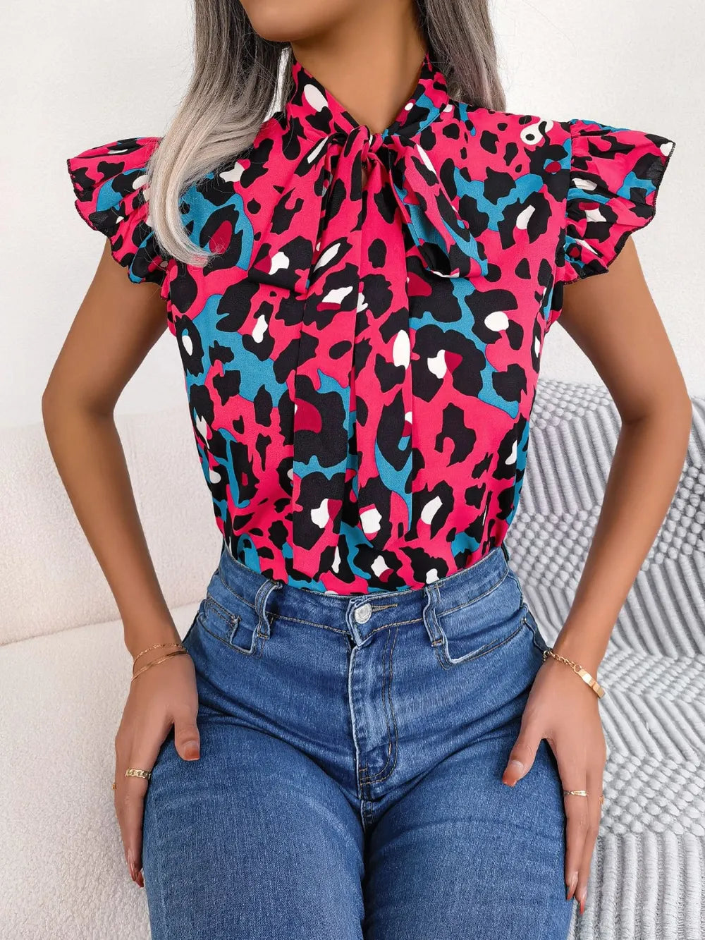 Leopard Tie Neck Cap Sleeve Blouse - V.I.P Digital Presence