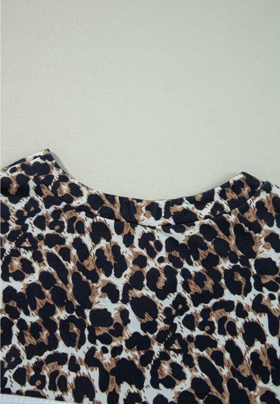 Waffle-Knit Leopard V-Neck Long Sleeve Blouse - V.I.P Digital Presence