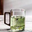 High end green tea cup with walnut handle and lid. High temperature resistant glass office drinking cup - V.I.P Digital Presence