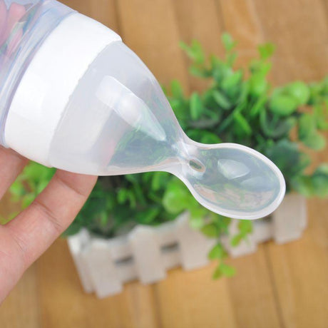 Newborn Baby Silicone Squeezing Feeding Bottle - V.I.P Digital Presence