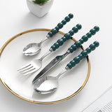 Set of 4 Stainless Steel price Creative Stainless Steel Colorful Pearl Handle Spoon Fork Knife High End Cutlery Set - V.I.P Digital Presence