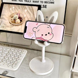 Soporte para teléfono móvil de escritorio con diseño de conejito de dibujos animados, ideal para estudiantes y personas perezosas.