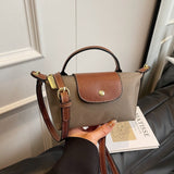 2025 Women's Mini Dumpling Handbag. Made of high - end nylon. Stylish shoulder/crossbody phone bag. - V.I.P Digital Presence