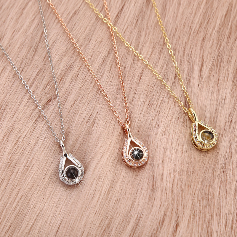Waterdrop shaped fashion projection necklace with 100 languages. I love you. Color photos, customized lover accessories - V.I.P Digital Presence