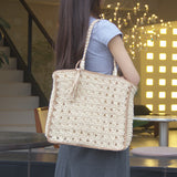 Square tassel single shoulder grass woven bag small fresh hollow handmade grass woven bag women's beach bag - V.I.P Digital Presence