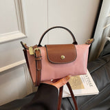 2025 Women's Mini Dumpling Handbag. Made of high - end nylon. Stylish shoulder/crossbody phone bag. - V.I.P Digital Presence