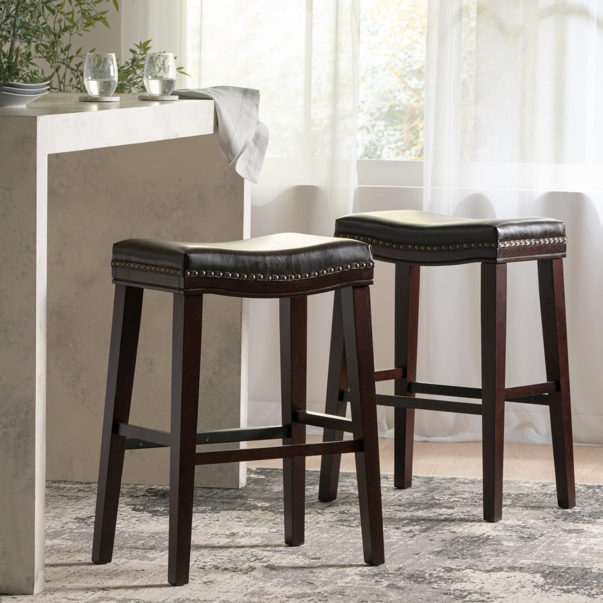 SADDLE STOOL - V.I.P Digital Presence