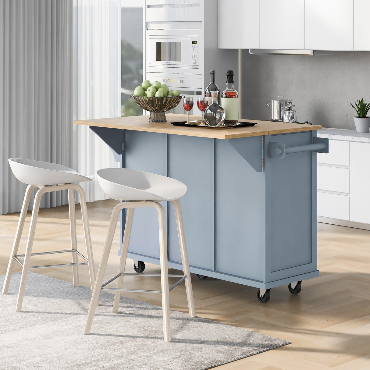 Kitchen handcart with rubber wood leaf countertop, storage cabinet, shelf, and 3 dining room drawers, gray blue - V.I.P Digital Presence