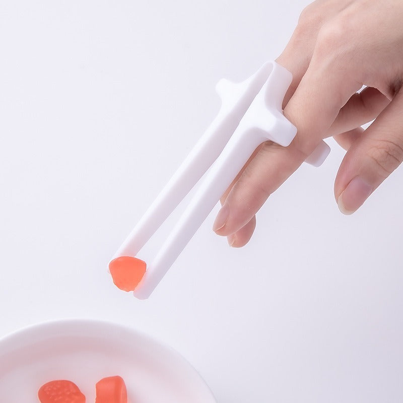 Playing games with fingers chopsticks snacking clips not dirty hands chopsticks finger loops - V.I.P Digital Presence