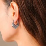 Leaf patchwork heart-shaped earrings with a niche design and titanium steel earrings - V.I.P Digital Presence