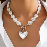Fashionable heart-shaped hollow pendant collarbone chain simple flat bead pearl necklace set - V.I.P Digital Presence