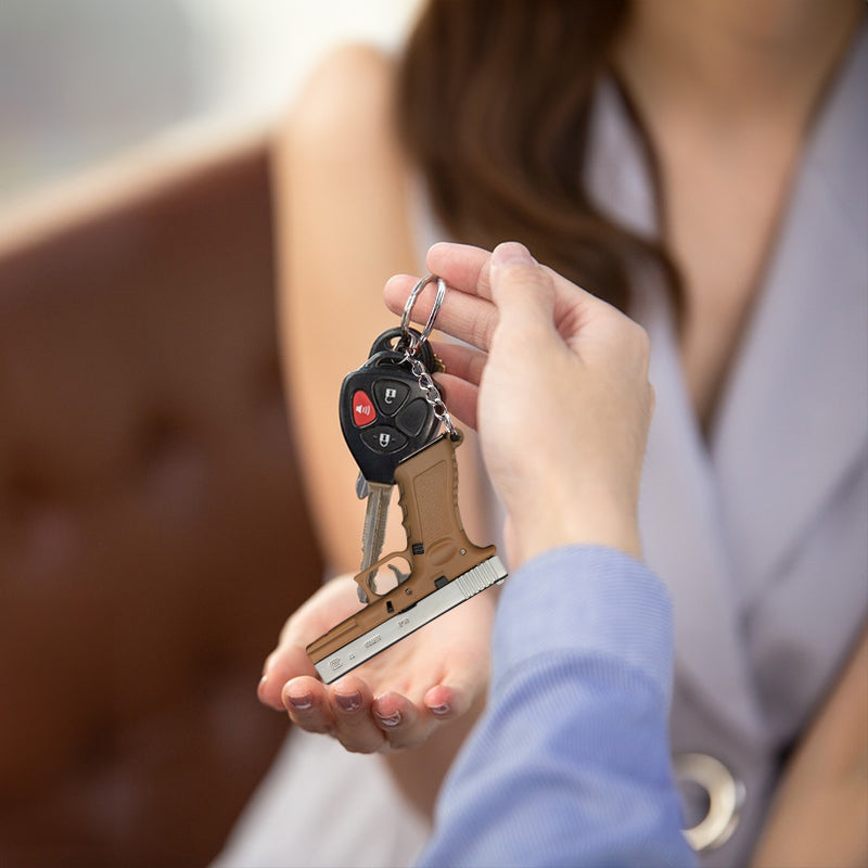 New Empire 1:3 Glock G17 alloy keychain, realistic gun model with detachable soldier gear & bullets. - V.I.P Digital Presence