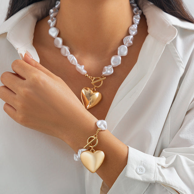 Fashionable heart-shaped hollow pendant collarbone chain simple flat bead pearl necklace set - V.I.P Digital Presence