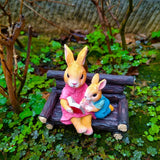 Simulated rabbit reading animal ornament - V.I.P Digital Presence