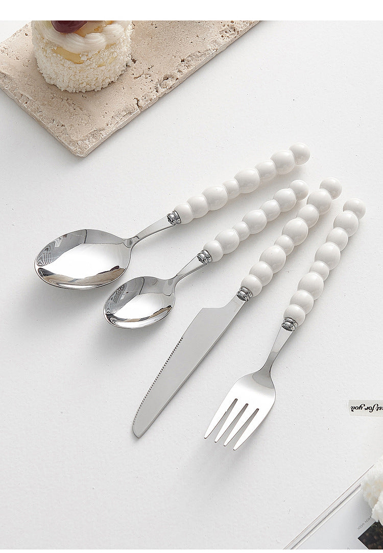 Set of 4 Stainless Steel price Creative Stainless Steel Colorful Pearl Handle Spoon Fork Knife High End Cutlery Set - V.I.P Digital Presence