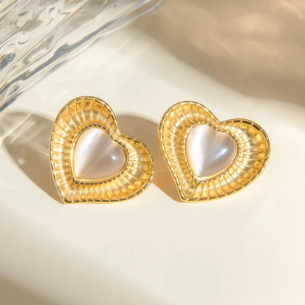 White cat eye stone earrings with niche temperament titanium steel earrings - V.I.P Digital Presence