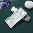 Bluetooth foldable keyboard can be connected to tablets laptops offices portable phones wireless keyboards - V.I.P Digital Presence