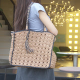 Square tassel single shoulder grass woven bag small fresh hollow handmade grass woven bag women's beach bag - V.I.P Digital Presence