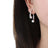 Elegant split design with high gloss pearl inlay simple titanium steel gold-plated earrings - V.I.P Digital Presence