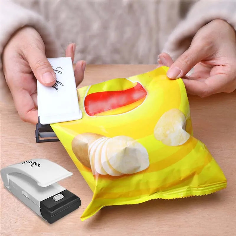Mini sealing machine small household plastic sealing machine snack moisture-proof sealing machine - V.I.P Digital Presence