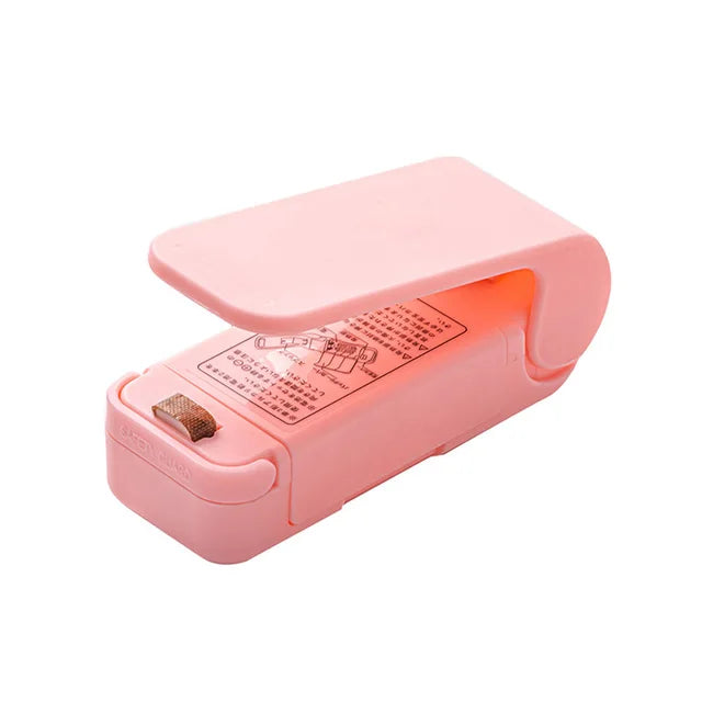 Mini sealing machine small household plastic sealing machine snack moisture-proof sealing machine - V.I.P Digital Presence
