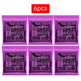 6 sets of Ernie Ball Slinky guitar strings (models 2003, 2215, 2223, 2221, nickel - wound) for electric & acoustic guitars - V.I.P Digital Presence