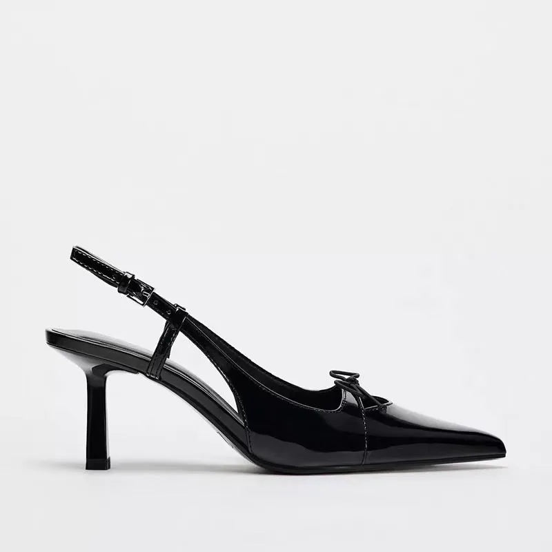 Black patent leather bow with pointed tip thin heel and a shallow strap for women's sandals - V.I.P Digital Presence