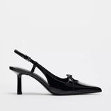 Black patent leather bow with pointed tip thin heel and a shallow strap for women's sandals - V.I.P Digital Presence
