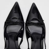 Black patent leather bow with pointed tip thin heel and a shallow strap for women's sandals - V.I.P Digital Presence