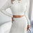Cable-Knit Round Neck Top and Skirt Sweater Set - V.I.P Digital Presence