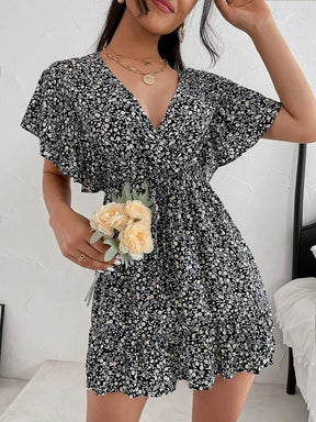 Cutout Ditsy Floral Surplice Flounce Sleeve Dress - V.I.P Digital Presence