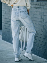 Distressed Asymmetric Waist Jeans - V.I.P Digital Presence