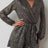 Full Size Sequin Surplice Tie Waist Long Sleeve Romper - V.I.P Digital Presence