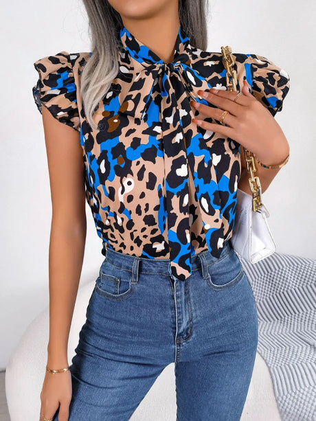Leopard Tie Neck Cap Sleeve Blouse - V.I.P Digital Presence