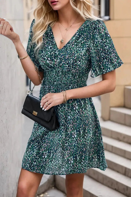Printed Smocked Crisscross V-Neck Mini Dress - V.I.P Digital Presence