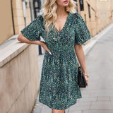 Printed Smocked Crisscross V-Neck Mini Dress - V.I.P Digital Presence