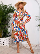 Printed Surplice Long Sleeve Midi Dress - V.I.P Digital Presence
