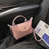 Retro fashion versatile women's bag, shoulder crossed, carrying high-end nylon dumpling bag - V.I.P Digital Presence