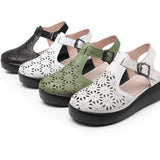 Thick soled toe sandals women's genuine leather sponge cake wedge heel hollowed out hole shoes flat bottomed women's shoes - V.I.P Digital Presence