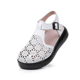 Thick soled toe sandals women's genuine leather sponge cake wedge heel hollowed out hole shoes flat bottomed women's shoes - V.I.P Digital Presence