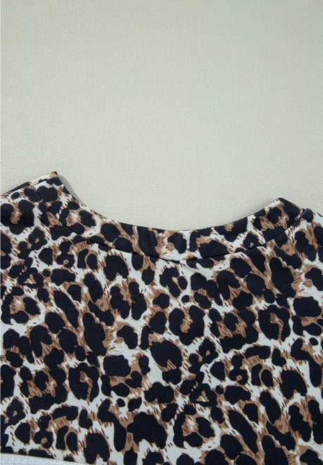 Waffle-Knit Leopard V-Neck Long Sleeve Blouse - V.I.P Digital Presence